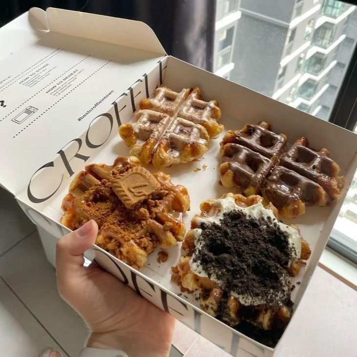 Artisan catering waffles with berries and chocolate sauce